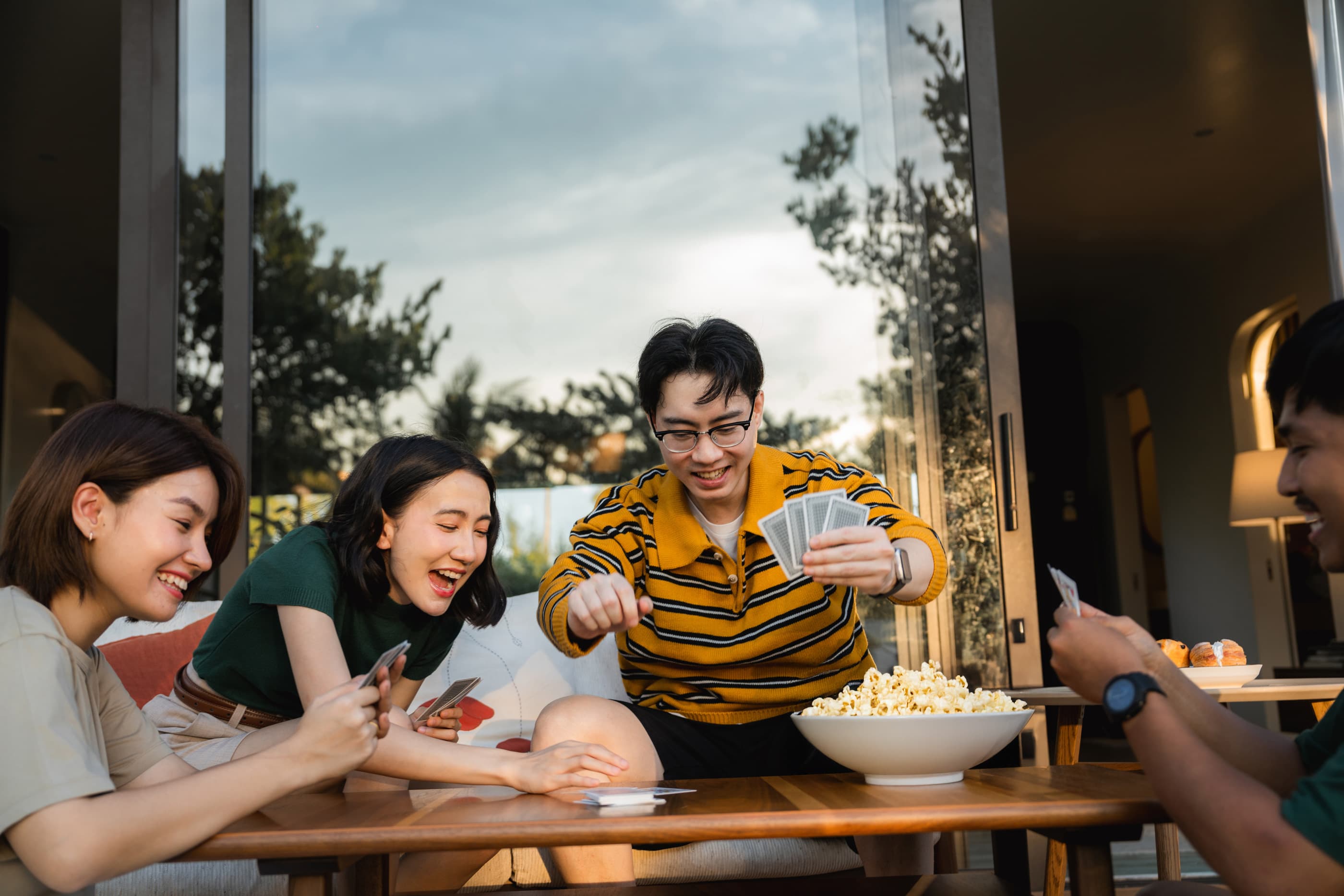 Young people playing cards